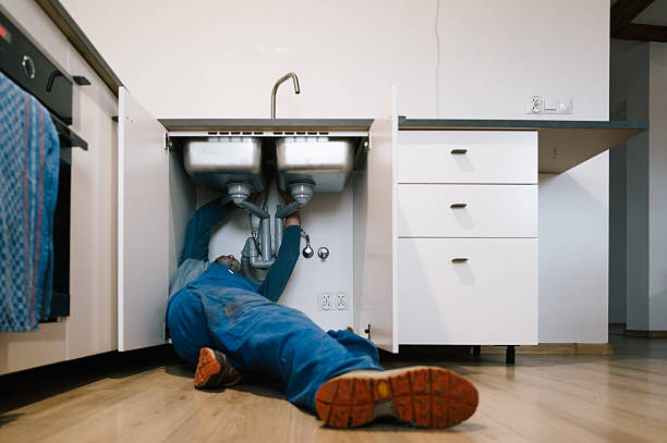 Professional Plumbing technician working in Voluntown, CT
